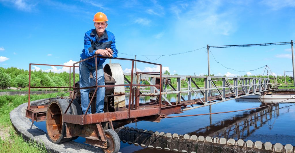 industrial worker at a waste water treatment plant